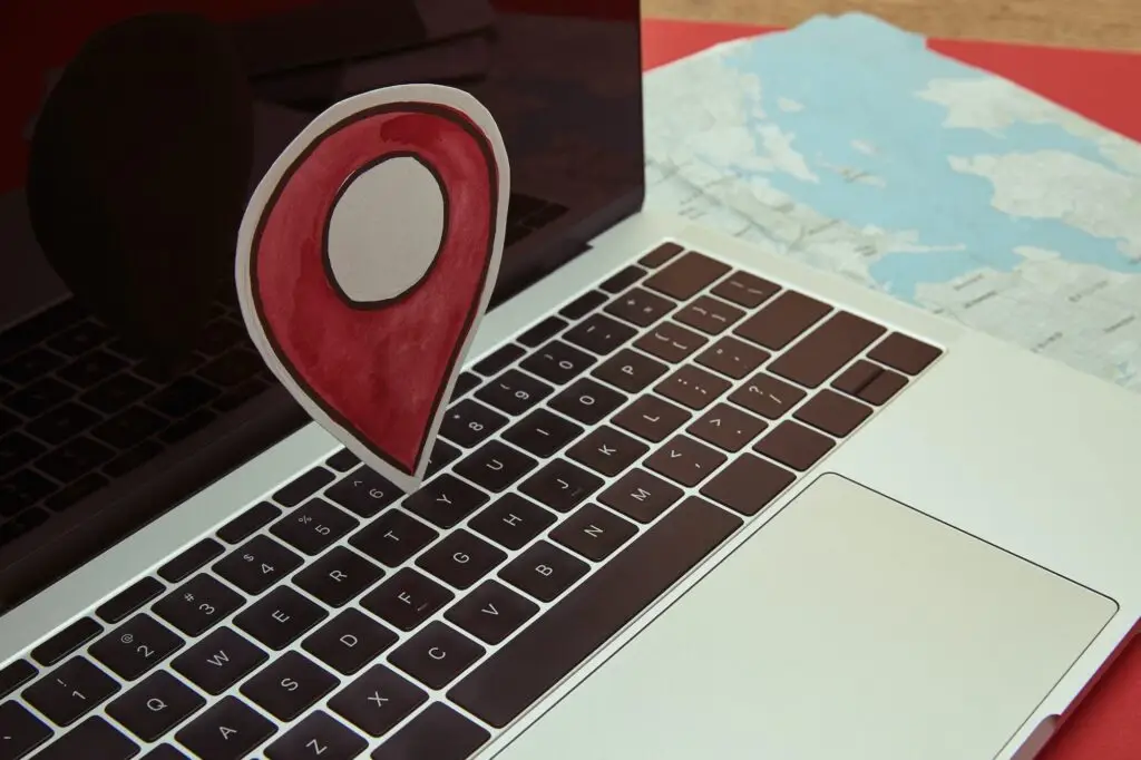 gps-location-sign-on-laptop-map-on-tabletop.jpg