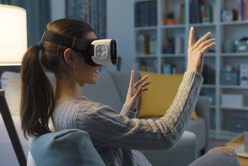 woman-relaxing-on-the-sofa-and-interacting-with-virtual-reality.jpg
